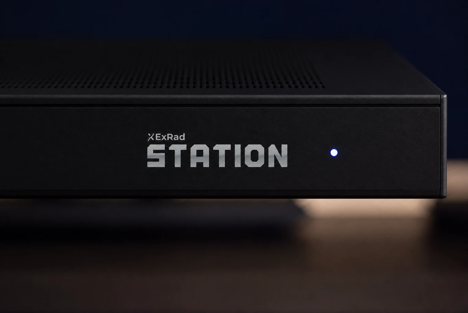 The ExRad Station wordmark applied to the workstation computer